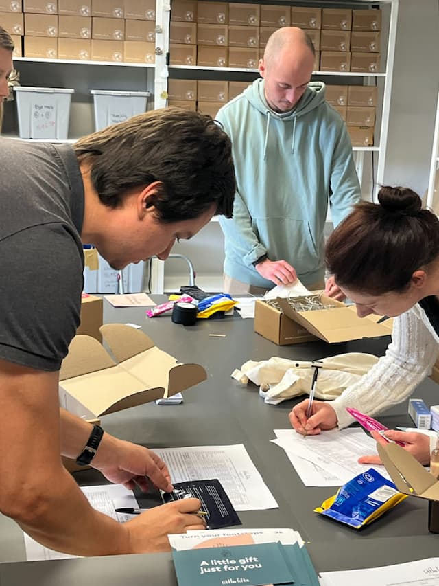 The Allies team packing boxes